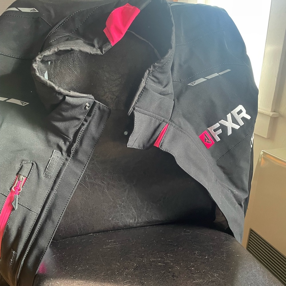 FXR winter jacket perfect for snowboarding snowmobiling or any winter activity